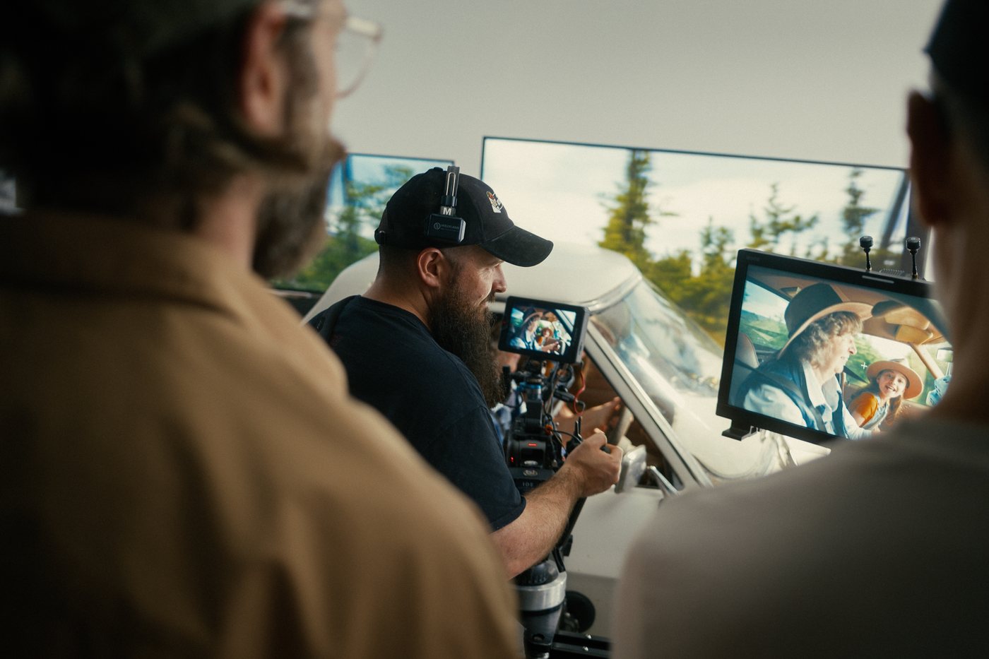 Oi Studios operator at camera, monitors showing the shot